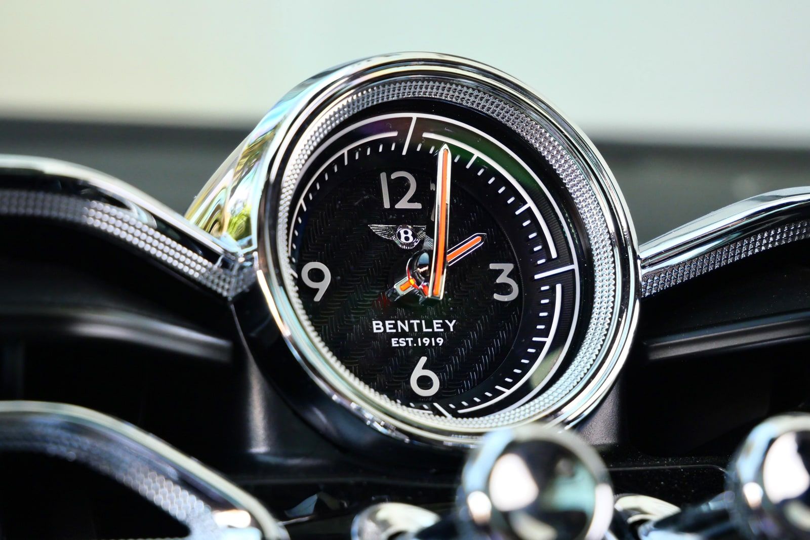 The analogue Bentley clock set into the dashboard of the Bentayga
