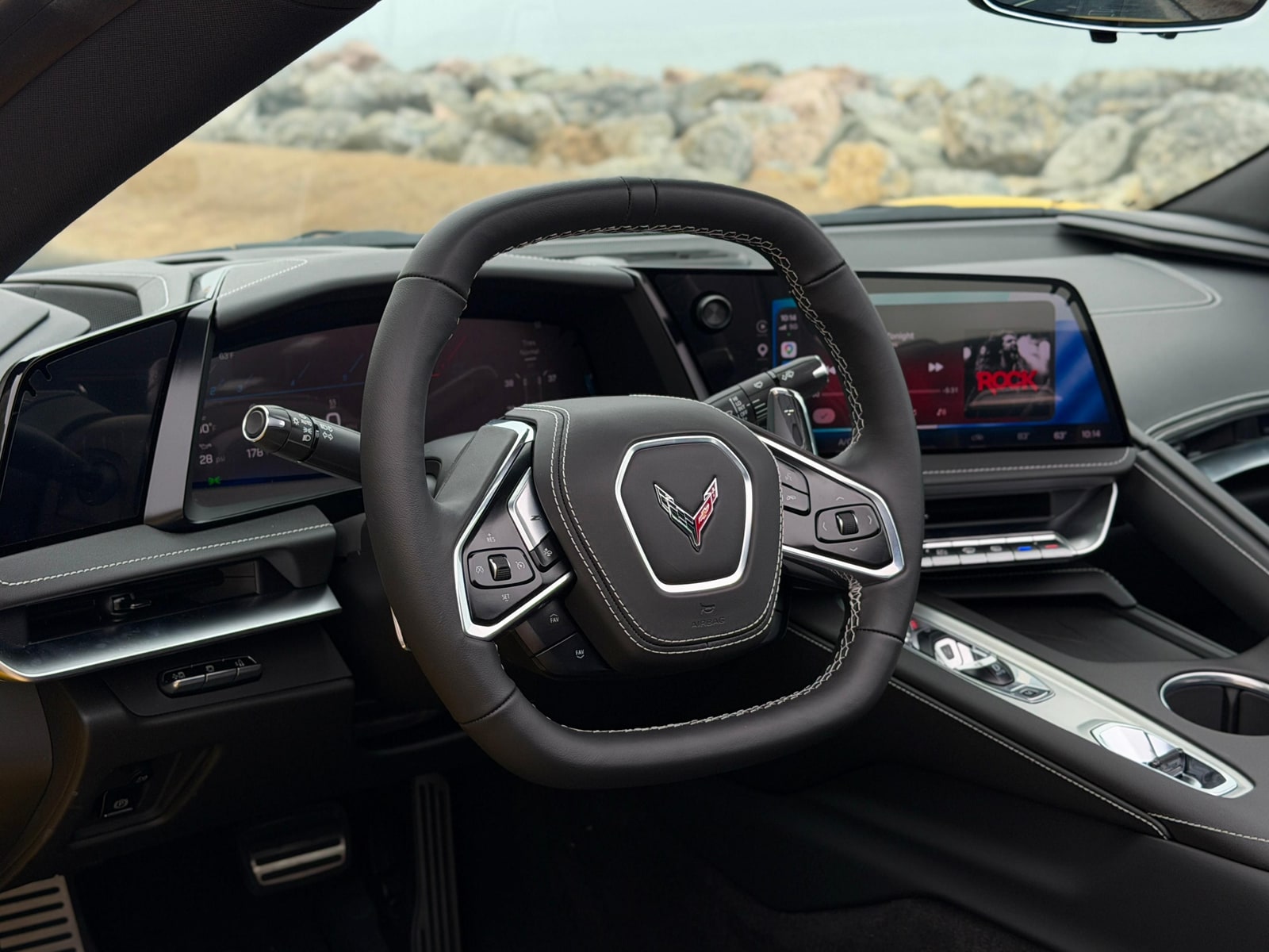 Squared-off steering wheel and driver-angled screens of the Chevrolet Corvette C8