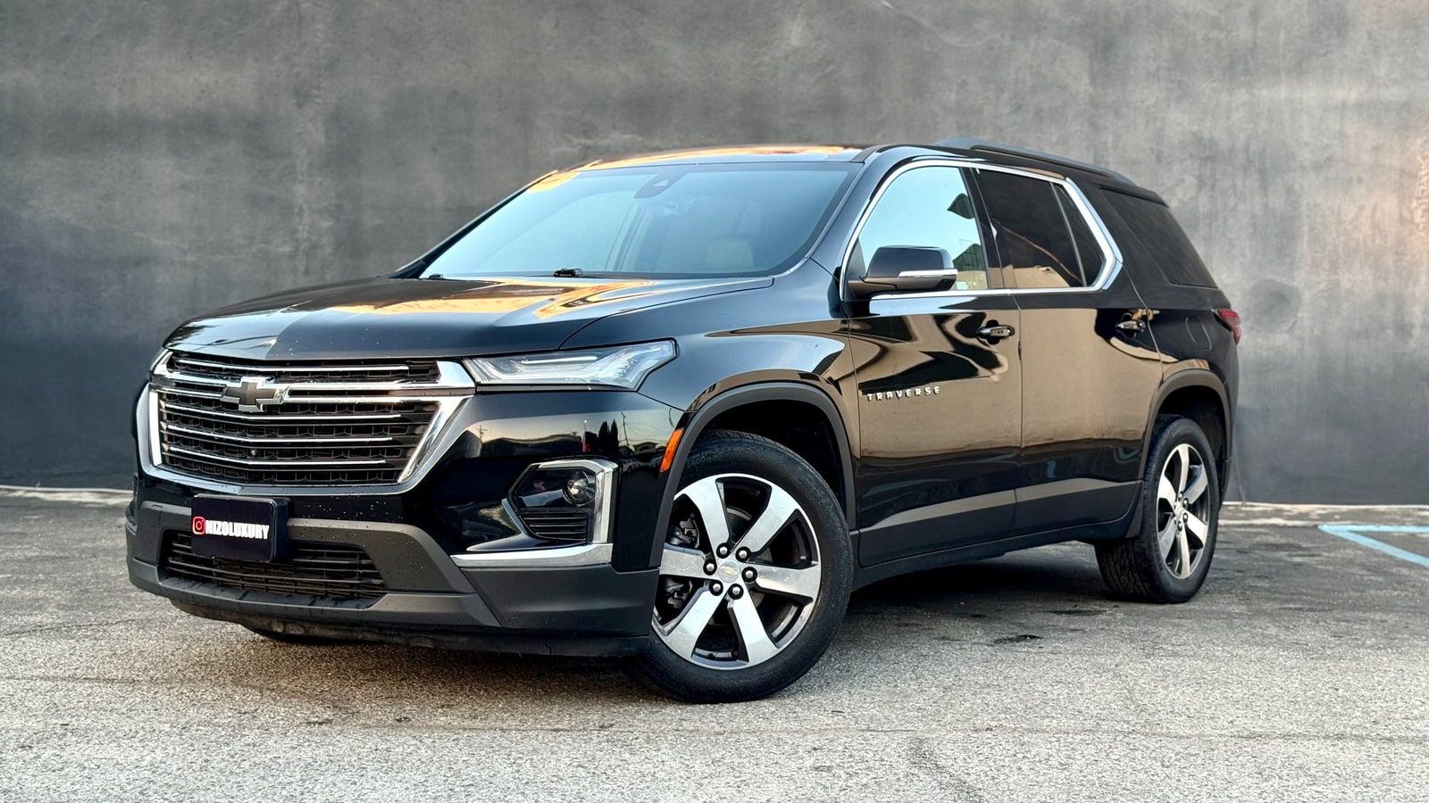 Black Chevrolet Traverse from a front three-quarter
