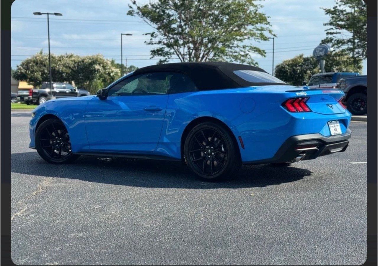 Blue Ford Mustang available to rent in Los Angeles, front three-quarter view