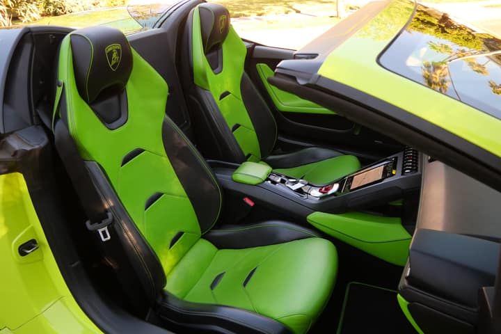 Green Lamborghini Huracán Evo Spyder rental in Los Angeles, rear three-quarter view