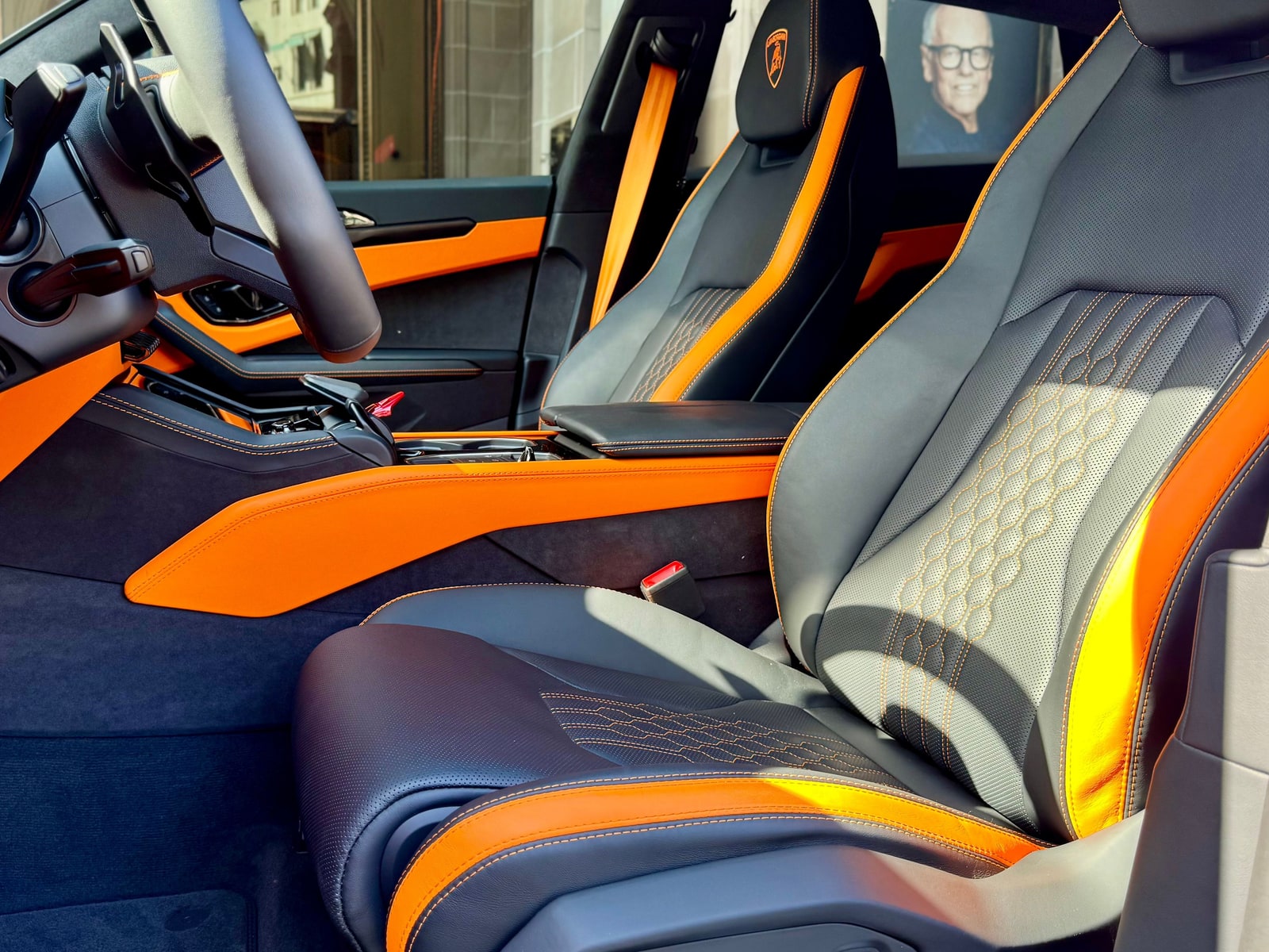 Black and orange front seats of the Lamborghini Urus SE
