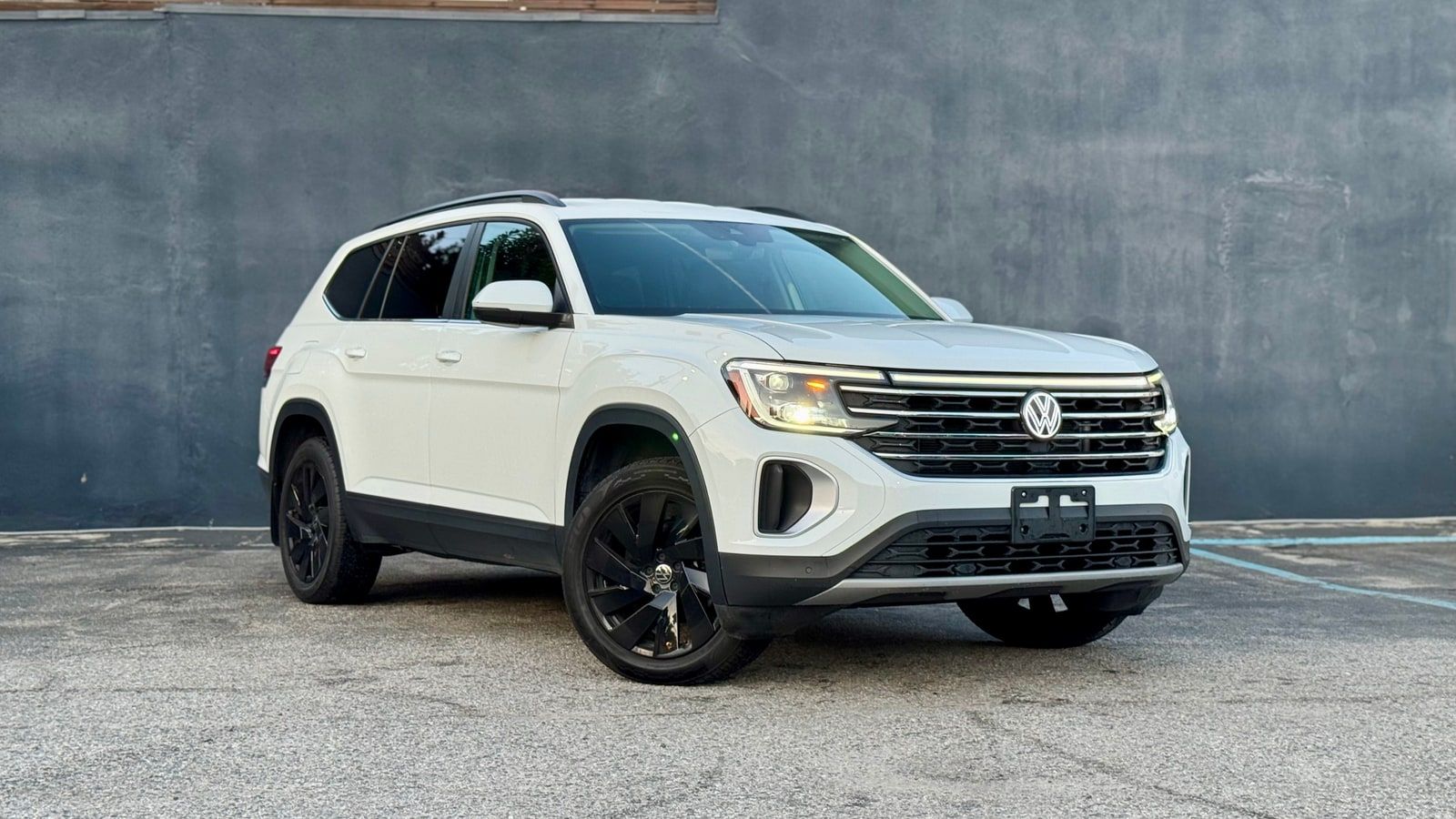 White Volkswagen Atlas from a front three-quarter